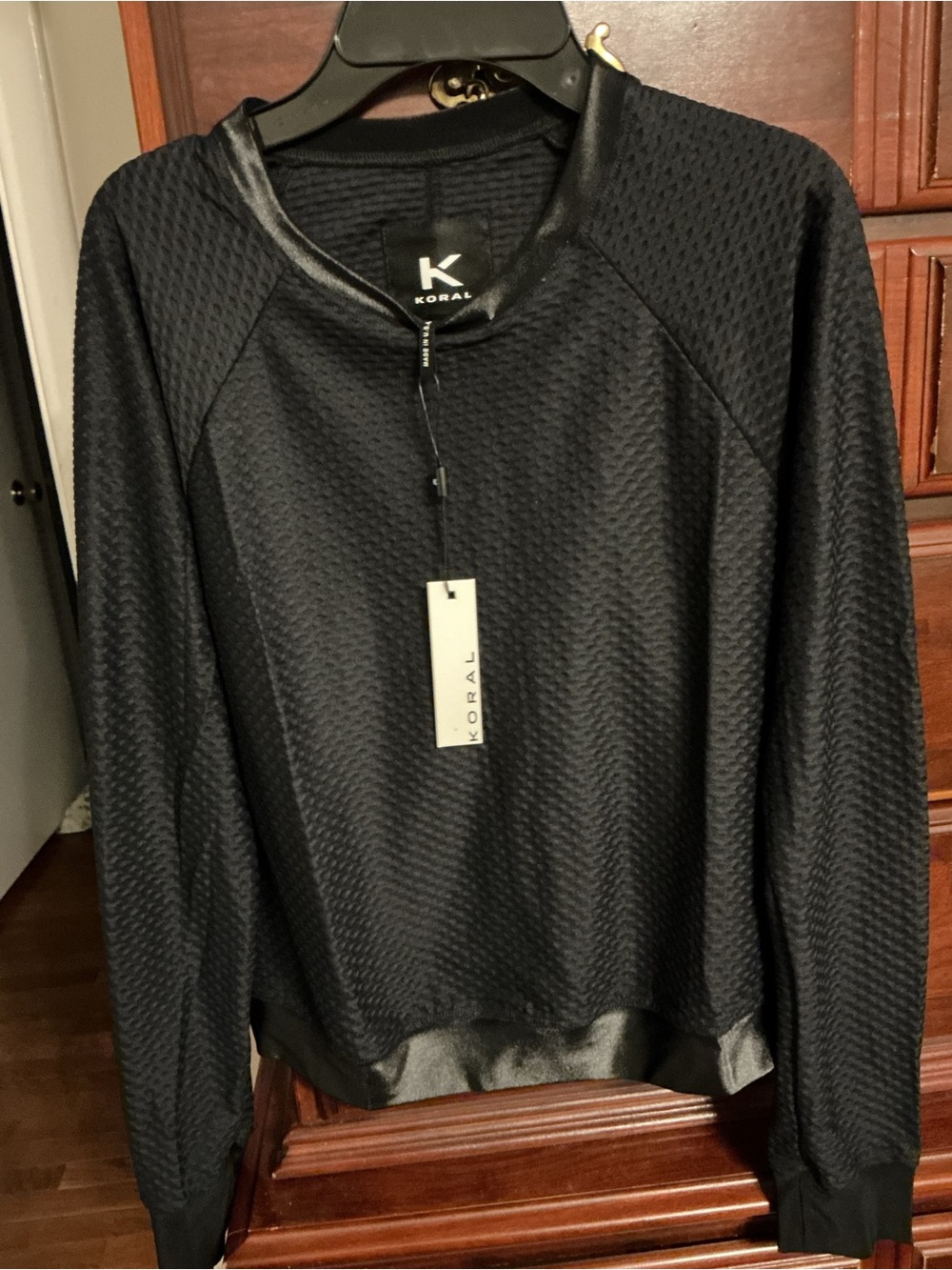 Women’s Koral  Sophia pullover Black NWT Longsleeve satin trim